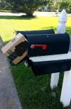 package sticking out of mailbox, delivery fail