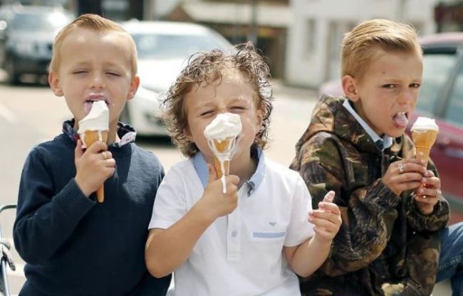 three bad boys and their ice dripping cream cones