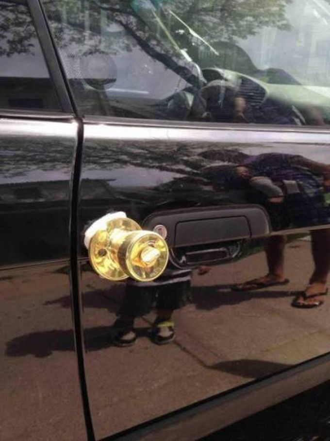 golden door knob on car