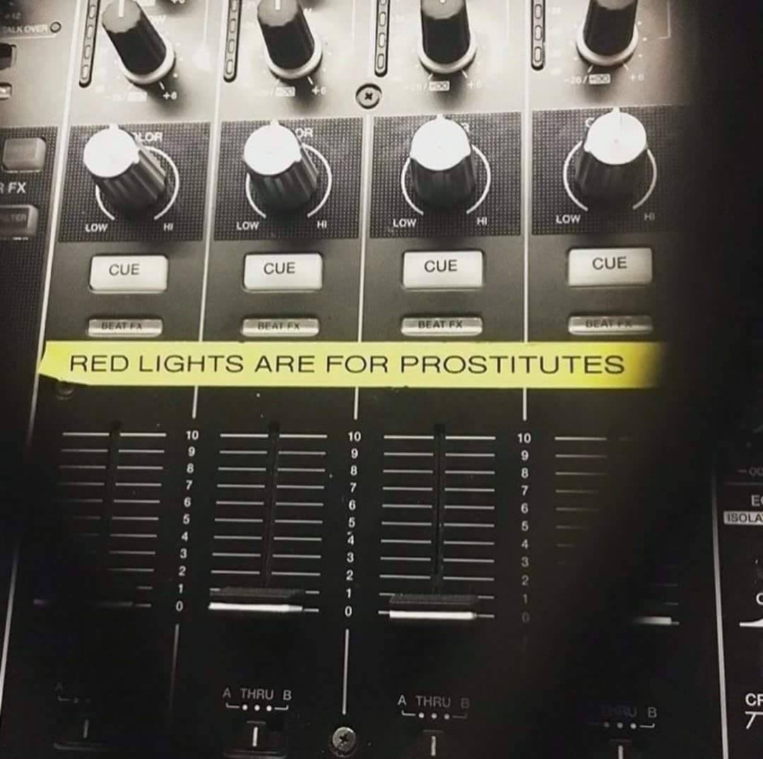 red lights are for prostitutes, label on dj booth mixer