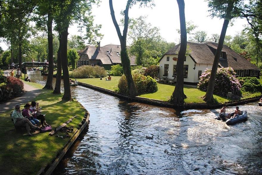 giethoorn in netherlands has no roads or any modern transportation at all, only canals