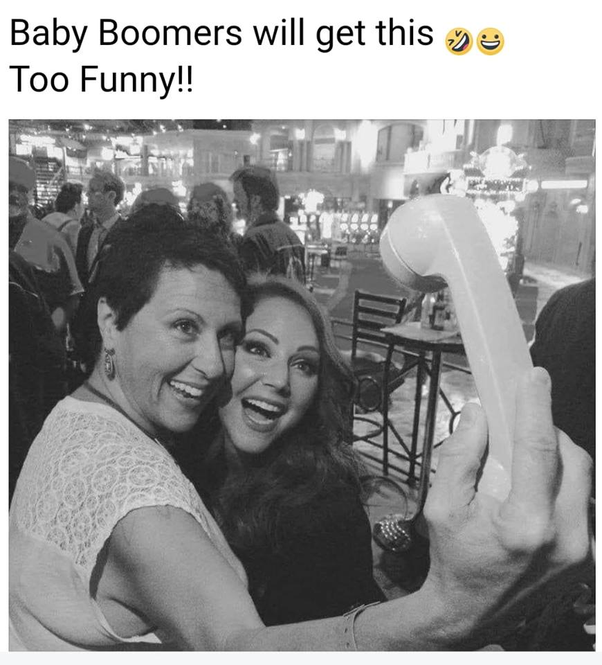 taking a selfie with your phone, baby boomers will get this