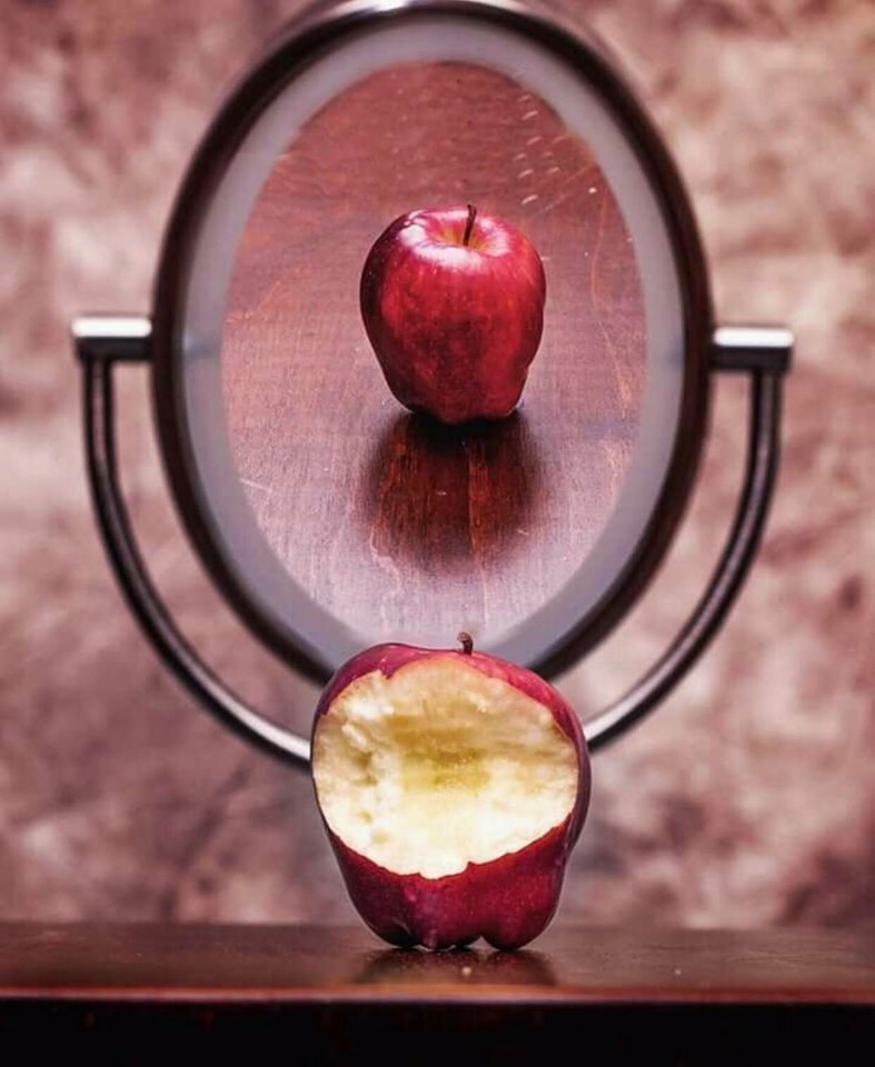 life on social media, half apple in the mirror
