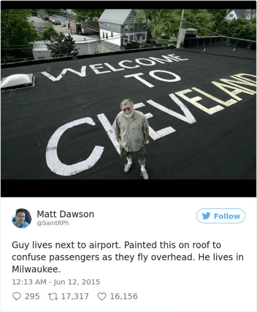 welcome to cleveland, guy lives next to airport, painted this on roof to confuse passengers as they fly overhead, he lives in milwaukee