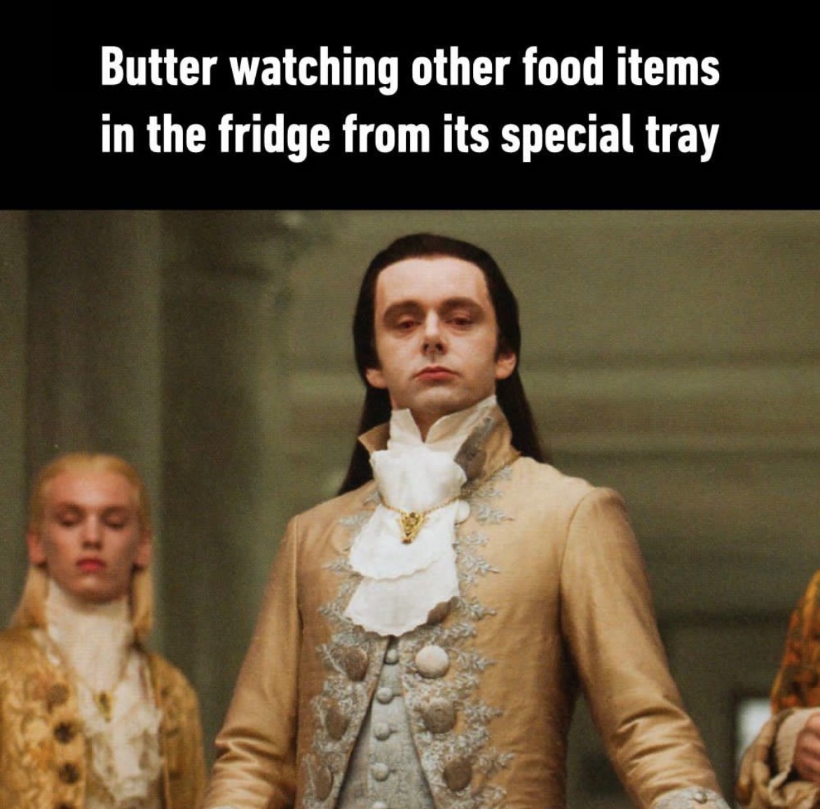 butter watching other food items in the fridge from its special tray