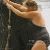 lady swings on rope into water but fails upside down, ouch, lol