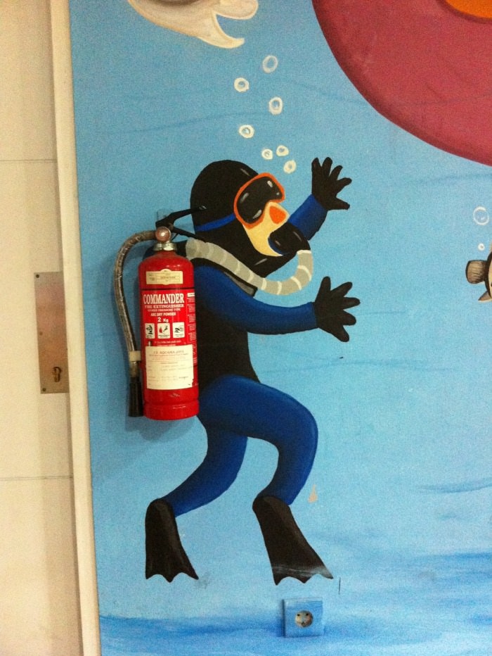 fire extinguisher hacked irl, scuba diver using fire extinguisher