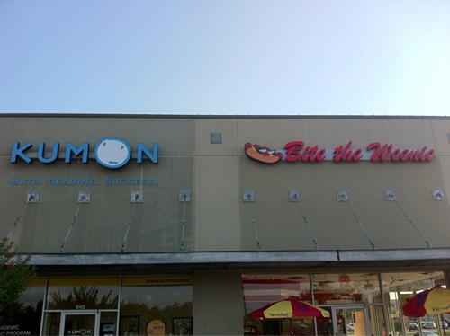 kumon bite the weenie, sign placement fail, win