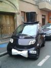 car, top hat, moustache, like a sir