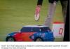 they put the discus in a remote controlled mini cooper to get it back to the athletes