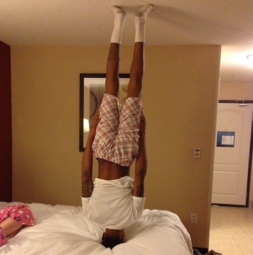 bed, vertical planking, headstand