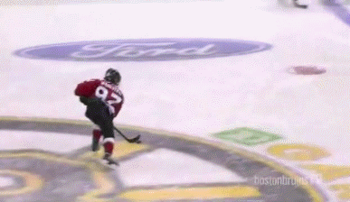 young hockey player scores a spinning trick goal
