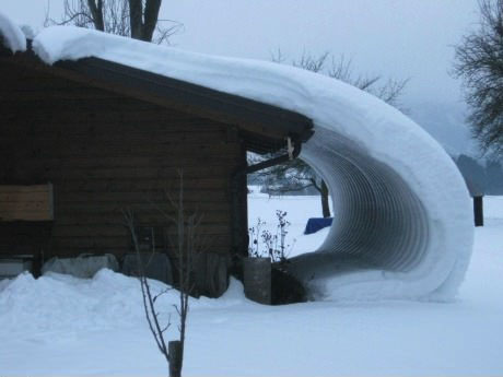 snow wave off the side of a house, cool ice