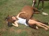 girl and her horse spooning