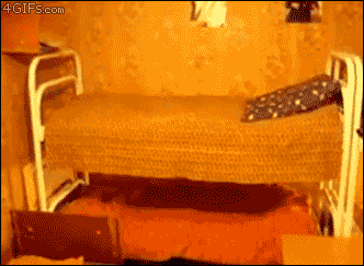 guy uses parkour wall jump to get up on bunk bed, then something unexpected happens