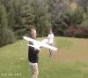 guy throws and gets taken down by model airplane, lol