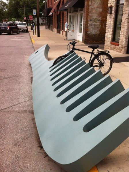 comb, bike rack, bicycle, street art