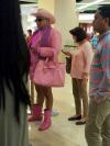 man wearing all pink ladies' clothes, poorly dressed, wtf