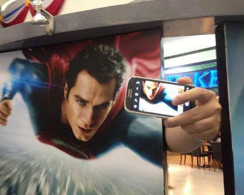 superman taking a selfie, movie poster hacked irl