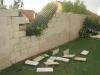 cactus, stone block fence, property damage