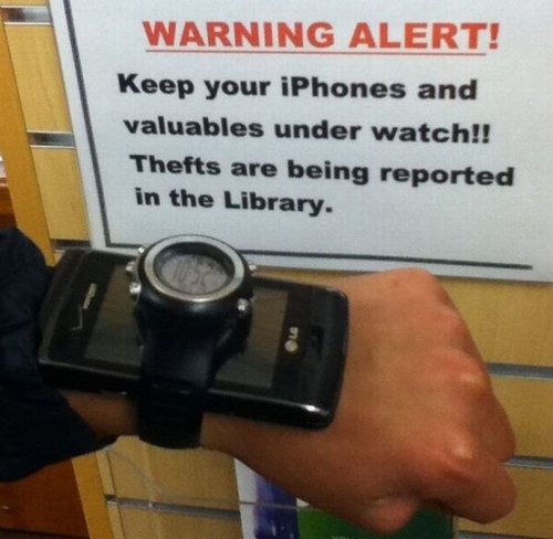 sign, iphone and valuables under watch, literal, lol, theft in the library