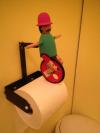 toilet paper figurine, unicycle, lol, product, wtf