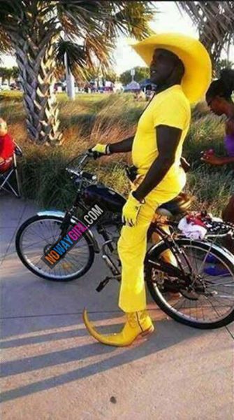 pimp, bicycle, yellow suit and hat