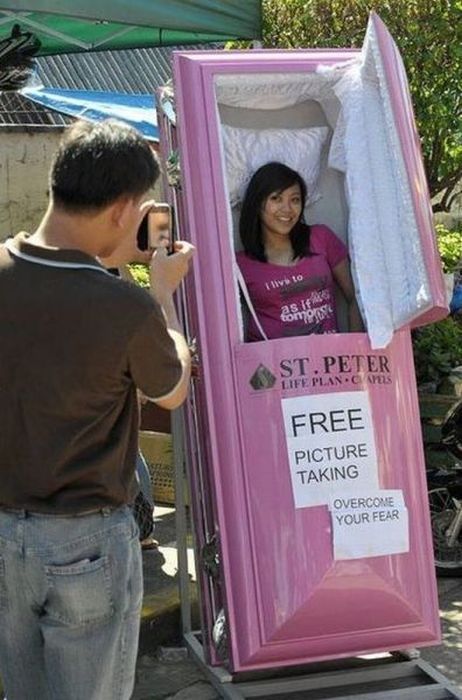 coffin, picture taking, wtf