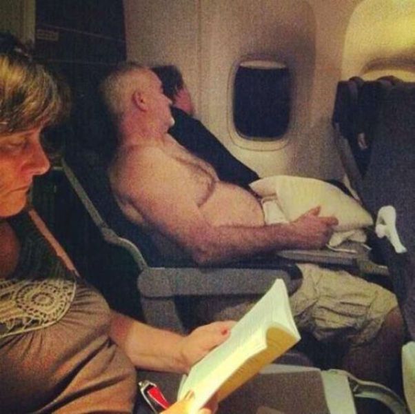 topless, no shirt on an airplane