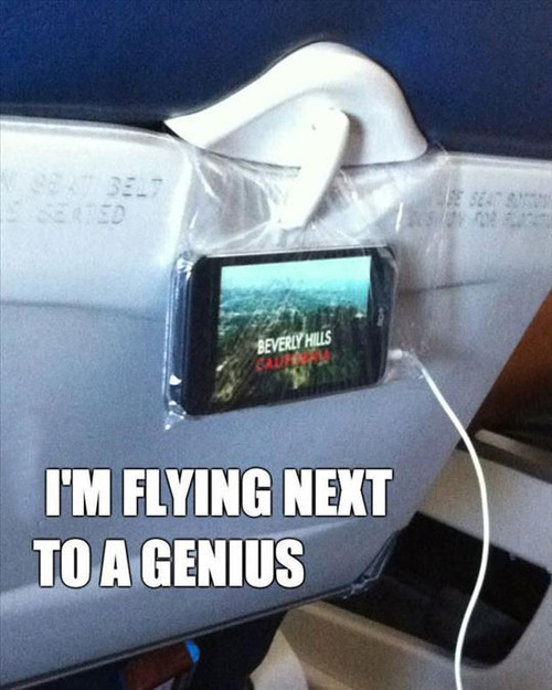 flying next to a genius, iphone, bag, airplane entertainment