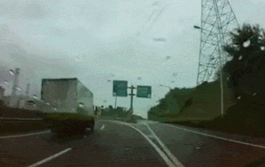 truck driver prevents accident by cutting man off, gif
