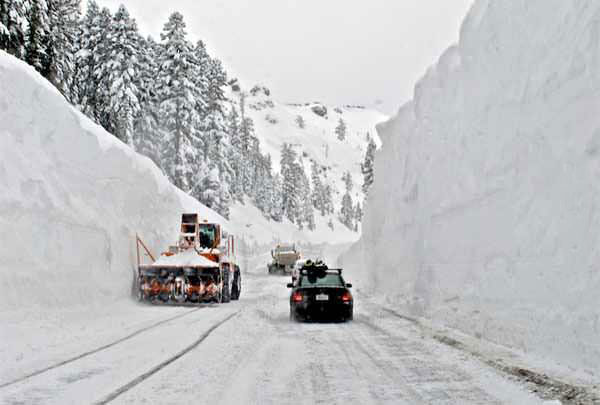 18' of snow, feet, road