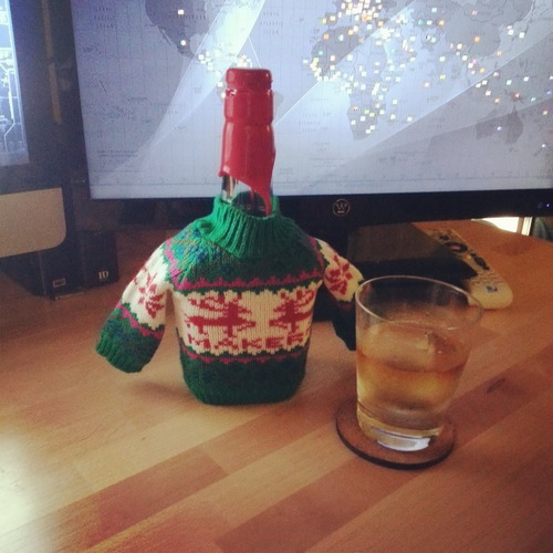 a christmas drink, bottle sweater