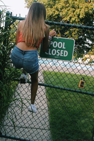 pool closed, sign, rebel, girl climbing fence
