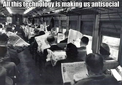 all this technology is making us anti-social, newspapers on the train