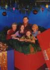 awkward family photos, inside a present box under a tree, christmas