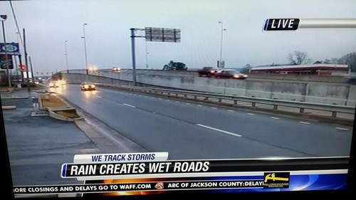 tv news, fail, captain obvious, rain creates wet roads