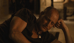 woody harrelson wiping tears with money, gif