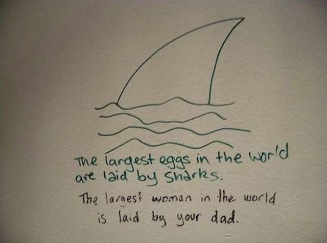 bathroom wall graffiti, the largest women in the world is laid by your dad, diss
