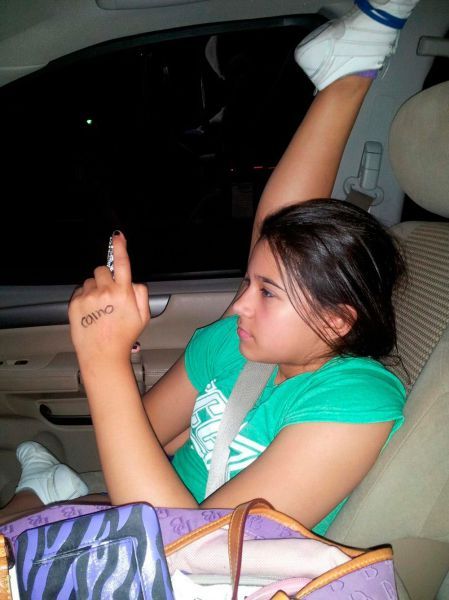 flexible girl in car, selfie