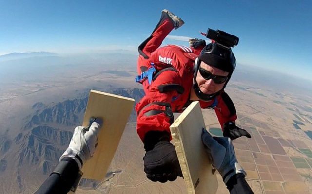 breaking a plank while skydiving