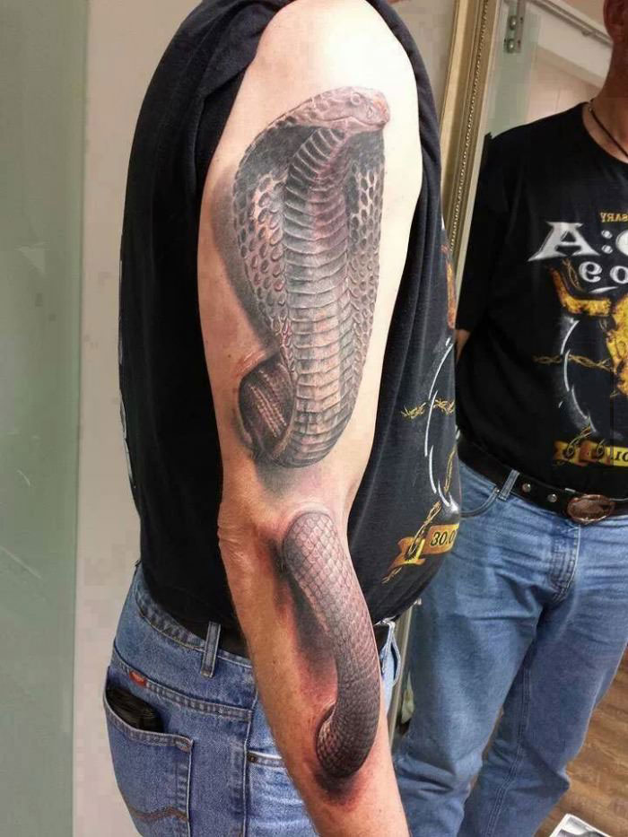 painful tattoo, cobra on arm, 3d