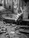 this little girl sits with her doll in the ruins of her london home that was bombed in 1940, war, historical photos