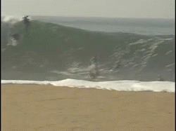 huge wave flings body surfer off his board, gif, ouch