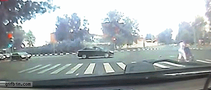 manhole cover lifts car while driven, gif