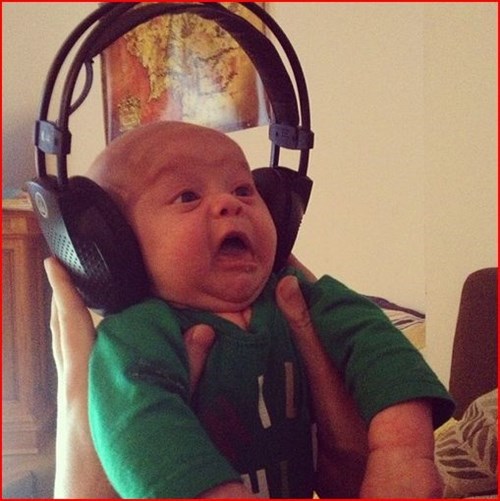 baby disapproves of musical selection, lol, funny face