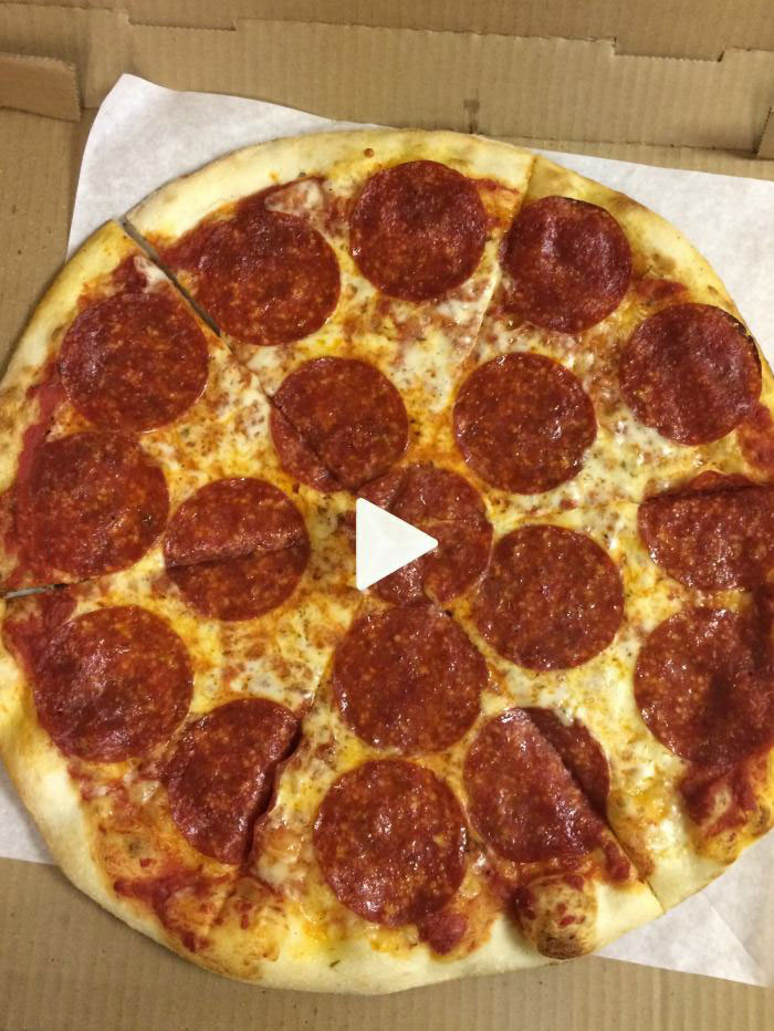 i took a picture of a pizza at work, looking at it now i really want to press play, troll, lol