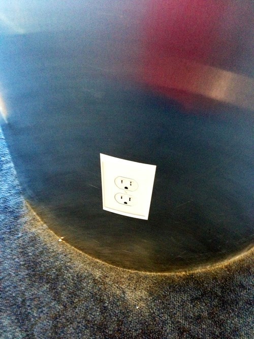 trolling with stickers, outlet on column prank