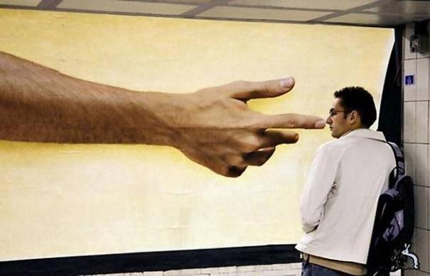 nose picking with street art, perspective