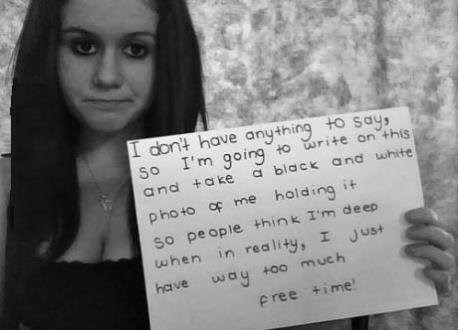 black and white photo holding a sign means you are deep